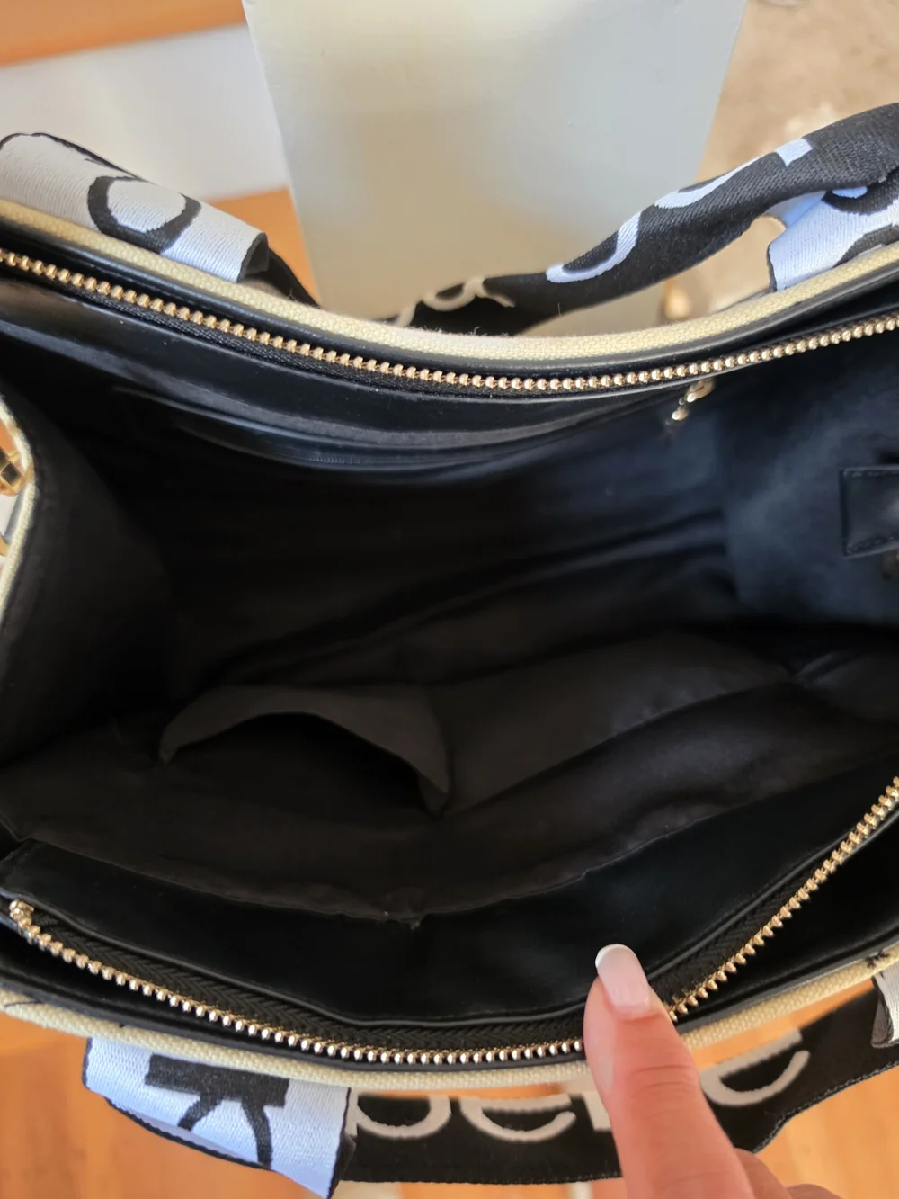 bebe Beige Canvas Crossbody with Black Logo Straps